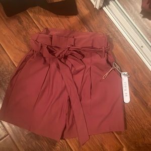 NWT paper bag of waist shorts